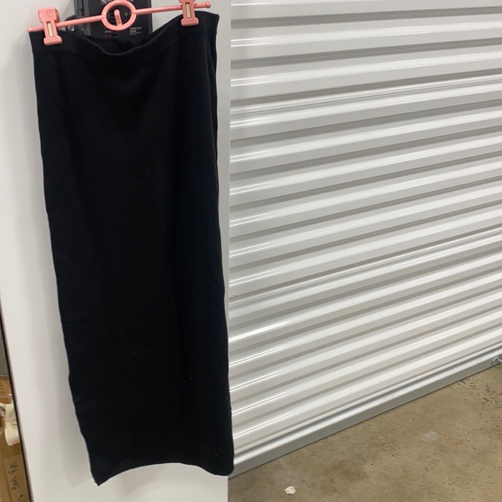 Black skirt designers original slit on one side size small